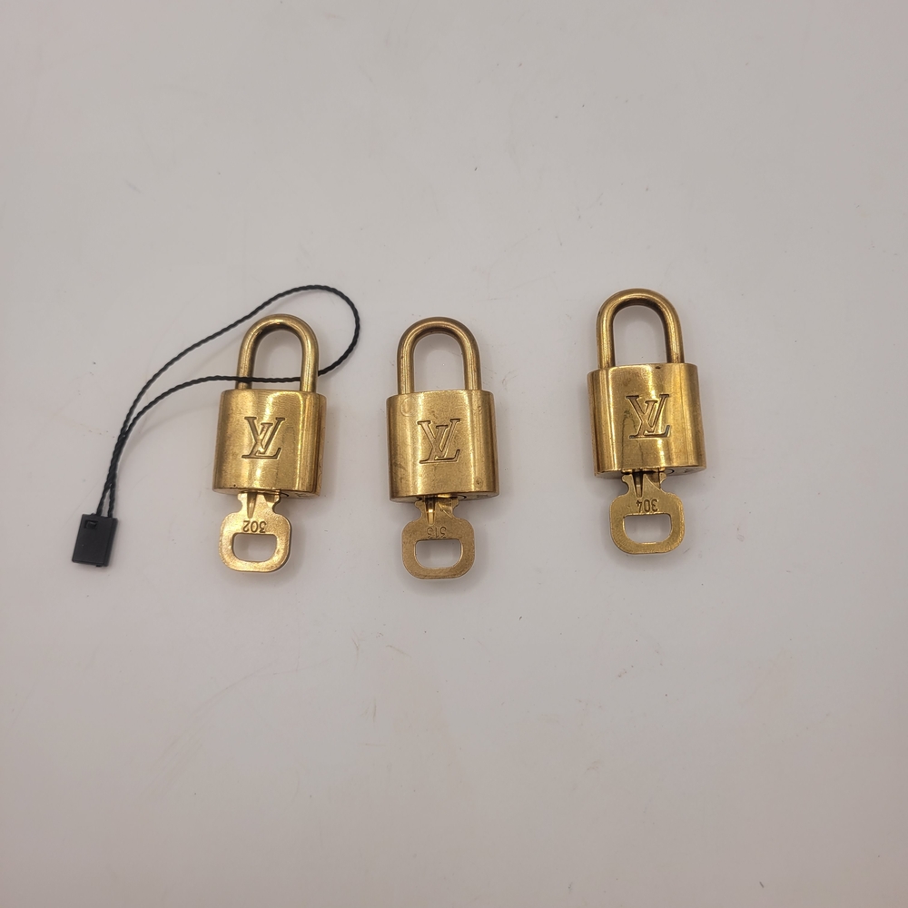 Louis Vuitton Gold Padlocks with Keys